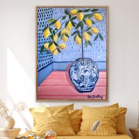 a painting of lemons in a vase on a wall